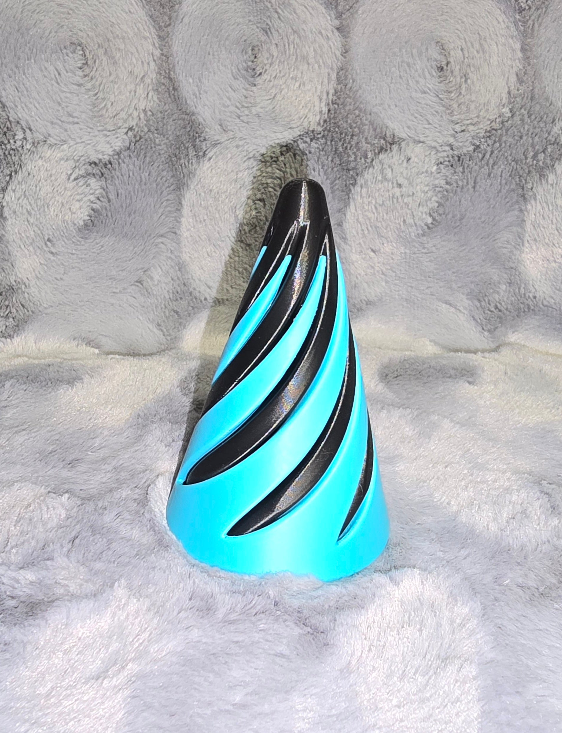 Spiral pass through fidgets